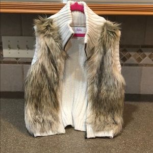 Faux fur and knit sweater vest. Nice condition.